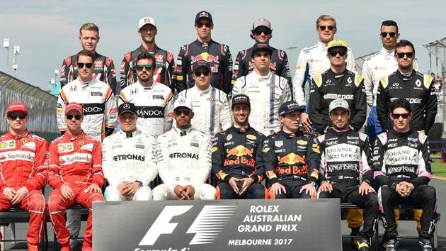 The class of 2017 -- Formula One drivers pose for the customary group photograph just before the start of the F1 Australian Grand Prix at Albert Park in Melbourne on Sunday. (AFP) The class of 2017 -- Formula One drivers pose for the customary group photograph just before the start of the F1 Australian Grand Prix at Albert Park in Melbourne on Sunday. (AFP)