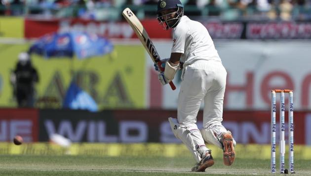 Cheteshwar Pujara plays a shot on Day 2 of the India vs Australia Dharamsala Test.(AP)