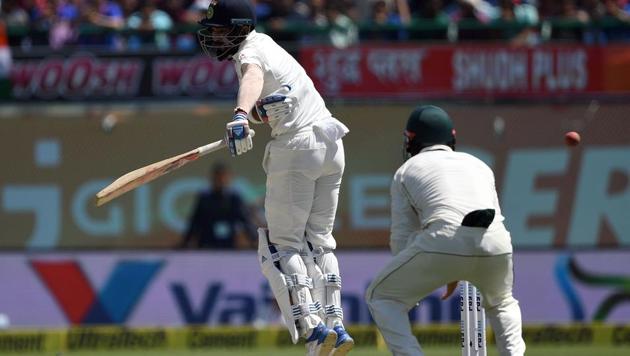 India cricket team's KL Rahul takes evasive measures against a sharp-bouncing ball during Day 2 of play of the fourth Test vs Australia cricket team in Dharamsala on Sunday. (AFP) India cricket team's KL Rahul takes evasive measures against a sharp-bouncing ball during Day 2 of play of the fourth Test vs Australia cricket team in Dharamsala on Sunday. (AFP)