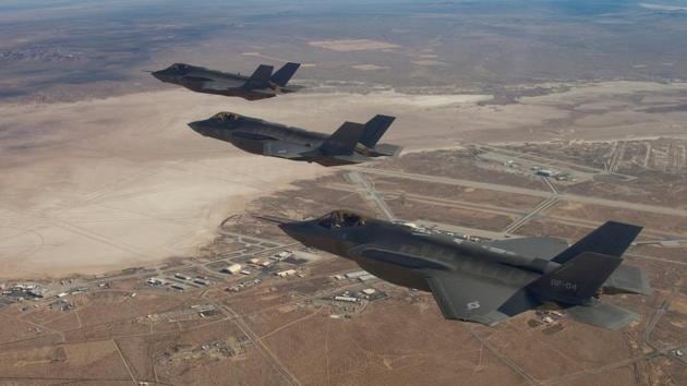 Three F-35 Joint Strike Fighters, (rear to front) AF-2, AF-3 and AF-4, flies over Edwards Air Force Base in this December 10, 2011 handout photo provided by Lockheed Martin. (REUTERS) Three F-35 Joint Strike Fighters, (rear to front) AF-2, AF-3 and AF-4, flies over Edwards Air Force Base in this December 10, 2011 handout photo provided by Lockheed Martin. (REUTERS)