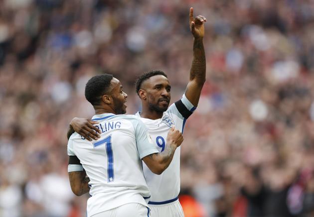 England's Jermain Defoe celebrates scoring their first goal against Lithuania on Sunday with teammate Raheem Sterling. (REUTERS) England's Jermain Defoe celebrates scoring their first goal against Lithuania on Sunday with teammate Raheem Sterling. (REUTERS)