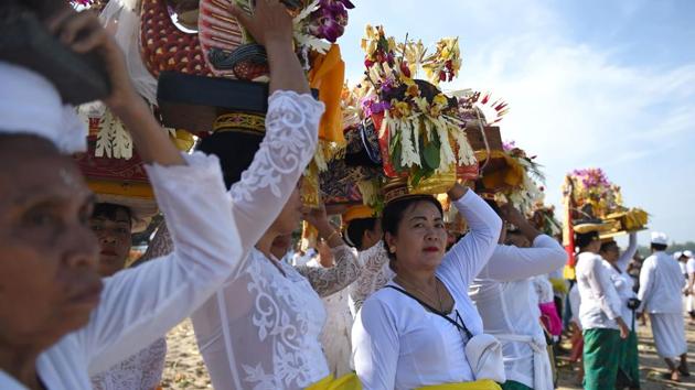 Balinese celebrate Melasti, a purification ceremony ahead of Neypi Day ...