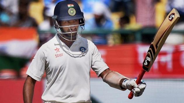 Cheteshwar Pujara celebrates his fifty during the second day of fourth Test match against Australia. (PTI) Cheteshwar Pujara celebrates his fifty during the second day of fourth Test match against Australia. (PTI)