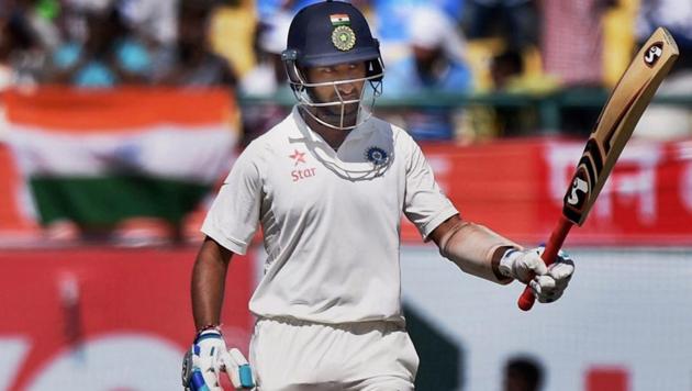 India’s Cheteshwar Pujara celebrates his fifty during the second day of the last test match against Australia at HPCA Stadium in Dharamshala on Sunday. (PTI) India’s Cheteshwar Pujara celebrates his fifty during the second day of the last test match against Australia at HPCA Stadium in Dharamshala on Sunday. (PTI)