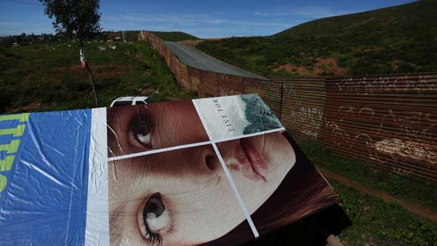 The roof of a house made with an advertisement banner is seen next to a section of the border fence separating Mexico and the United States, on the outskirts of Tijuana, Mexico. (Edgard Garrido/REUTERS) The roof of a house made with an advertisement banner is seen next to a section of the border fence separating Mexico and the United States, on the outskirts of Tijuana, Mexico. (Edgard Garrido/REUTERS)