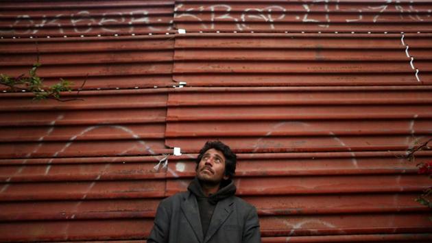 Joaquin, 36, a chef from Guatemala who says he was deported from the United States, poses for a photograph while leaning on a section of the border fence separating Mexico and the United States, in Tijuana, Mexico. I've tried to cross so many times that the (U.S.) border guards even got to know me, but I never made it back, said Joaquin, who makes a living by collecting trash in Tijuana that he tries to sell to a local recycling plant. (Edgard Garrido/REUTERS) Joaquin, 36, a chef from Guatemala who says he was deported from the United States, poses for a photograph while leaning on a section of the border fence separating Mexico and the United States, in Tijuana, Mexico. I've tried to cross so many times that the (U.S.) border guards even got to know me, but I never made it back, said Joaquin, who makes a living by collecting trash in Tijuana that he tries to sell to a local recycling plant. (Edgard Garrido/REUTERS)