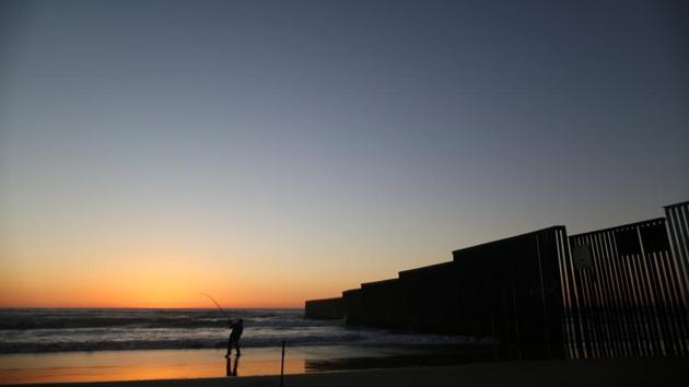 A man is fishing next to the fence separating Mexico and the United States, in Tijuana, Mexico. (Edgard Garrido/REUTERS) A man is fishing next to the fence separating Mexico and the United States, in Tijuana, Mexico. (Edgard Garrido/REUTERS)