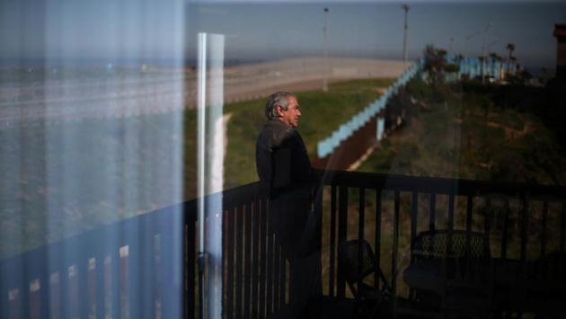 Mexican architect Carlos Torres, 68, is reflected in a glass window of his house near a section of the double border fences separating Mexico and the United States, in Tijuana, Mexico. Walls won't halt immigration,Torres said. Trump, he said, doesn't know what he's talking about. Here at this fence, people keep crossing every week. (Edgard Garrido/REUTERS) Mexican architect Carlos Torres, 68, is reflected in a glass window of his house near a section of the double border fences separating Mexico and the United States, in Tijuana, Mexico. Walls won't halt immigration,Torres said. Trump, he said, doesn't know what he's talking about. Here at this fence, people keep crossing every week. (Edgard Garrido/REUTERS)