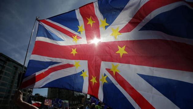 A demonstrator waves a Union flag, decorated with the stars of the EU flag, as they prepare to participate in an anti Brexit, pro-European Union (EU) march in London, ahead of the British government's planned triggering of Article 50 next week. Britain will launch the process of leaving the European Union on March 29, setting a historic and uncharted course to become the first country to withdraw from the bloc by March 2019. (Daniel Leal-Olivas/AFP) A demonstrator waves a Union flag, decorated with the stars of the EU flag, as they prepare to participate in an anti Brexit, pro-European Union (EU) march in London, ahead of the British government's planned triggering of Article 50 next week. Britain will launch the process of leaving the European Union on March 29, setting a historic and uncharted course to become the first country to withdraw from the bloc by March 2019. (Daniel Leal-Olivas/AFP)