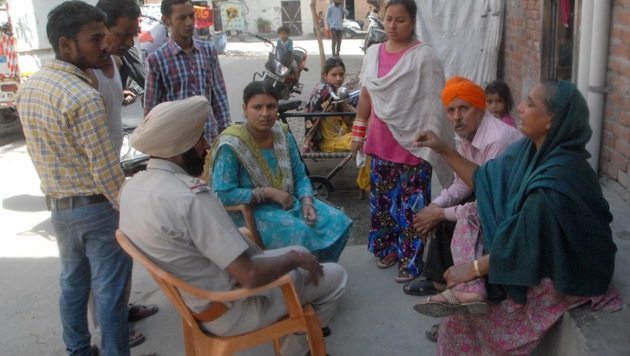 Police have arrested Harpreet Singh for the crime. His family members, however, said that this could be the handiwork of children staying in the house who tore the pages and threw them in the nearby plot.(Gurminder Singh/HT Photo)