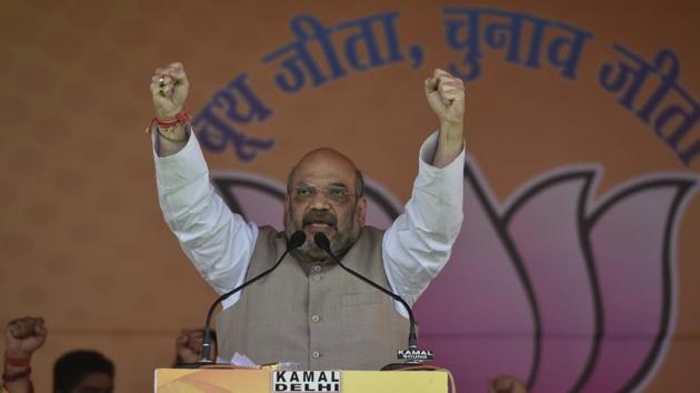 BJP president Amit Shah speaks ahead of the MCD elections at Ramlila Ground in New Delhi on Saturday. (Vipin Kumar/HT PHOTO) BJP president Amit Shah speaks ahead of the MCD elections at Ramlila Ground in New Delhi on Saturday. (Vipin Kumar/HT PHOTO)