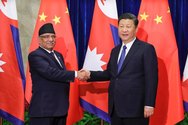 Chinese President Xi Jinping with Nepalese Prime Minister Pushpa Kamal Dahal “Prachanda” in Beijing on Monday.(AFP)