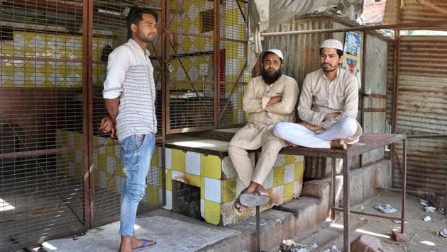 The shop owners questioned why they have been asked to shut shop suddenly when the corporation was allowing them to operate without a licence renewal for the last two years.(Salman Ali/HT)