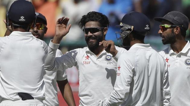 Ravindra Jadeja celebrates the dismissal of Australia's Shaun Marsh on Day 3 of the fourth India vs Australia Test Dharmsala on Monday. Catch full cricket score of India vs Australia here.(AP)