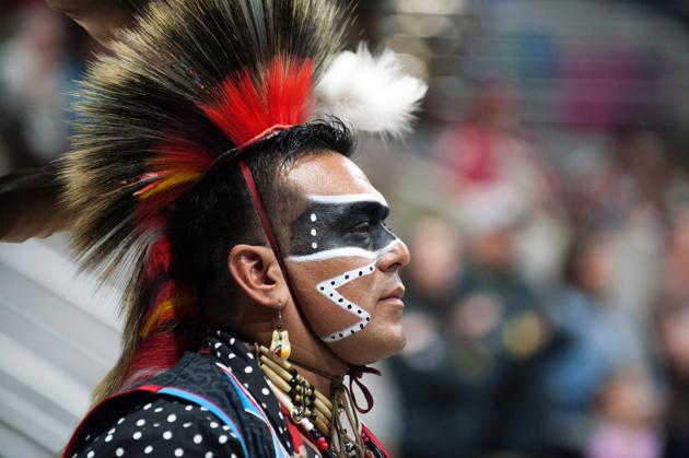 Raul Figueroa of the Assiniboine Sioux Nation poses for a portrait prior to the Grand Entry during the 43rd Annual Denver March Powwow. (Jason Connolly / AFP)