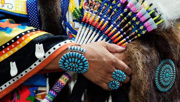 A Native American woman wears turquoise jewelry during the 43rd Annual Denver March Powwow. (Jason Connolly / AFP)