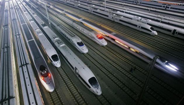 China's CRH high-speed trains at a maintenance base in Wuhan. Chinese daily Global Times said India should not have protectionist tendencies as it will hinder economic growth in the country when it wants to bring in high-speed trains.(AP File) China's CRH high-speed trains at a maintenance base in Wuhan. Chinese daily Global Times said India should not have protectionist tendencies as it will hinder economic growth in the country when it wants to bring in high-speed trains.(AP File)