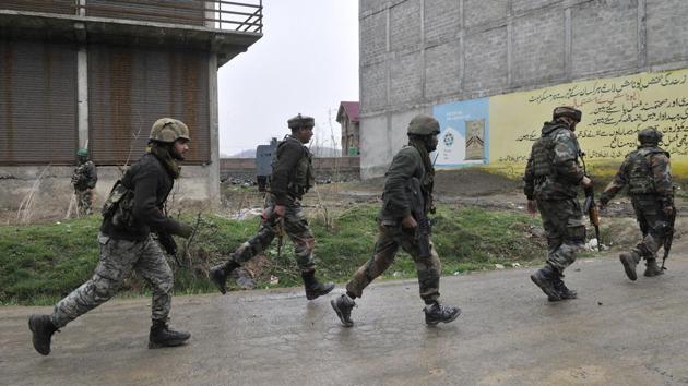 The operation turned into a gunbattle after militants opened fire on security forces, a police spokesperson said. (Waseem Andrabi / HT Photo)