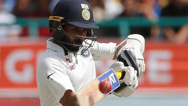 Ajinkya Rahane plays a pull shot on Day 4 of the fourth Test in Dharamsala on Tuesday. Rahane scored a brisk 38 as India won the Test by 8 wickets to clinch the series 2-1