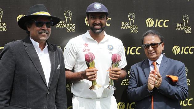 Kapil Dev, Sunil Gavaskar and Ravichandran Ashwin of India with the Garfield Sobers Trophy and the ICC Test Player of the year trophy. (BCCI) 