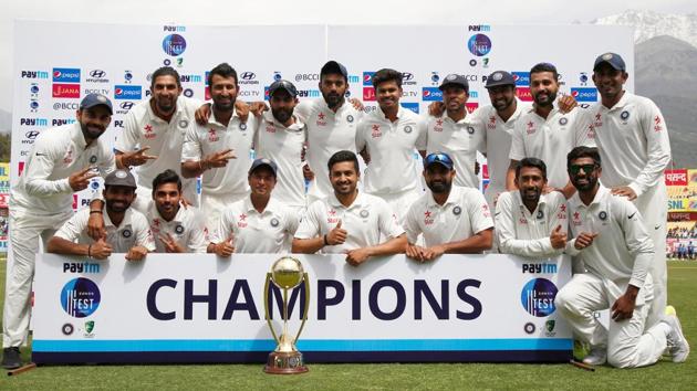 The Indian cricket team players pose with the Border–Gavaskar Trophy. (BCCI)