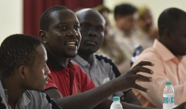 People of African origin discussing their problems with Delhi Police officials in June 2016. (Raj K Raj/HT Photo) People of African origin discussing their problems with Delhi Police officials in June 2016. (Raj K Raj/HT Photo)