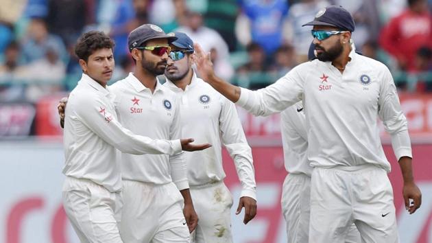 Kuldeep Yadav (left) picked four wickets in the first innings of the India vs Australia Dharamsala Test that India won by eight wickets.(PTI)