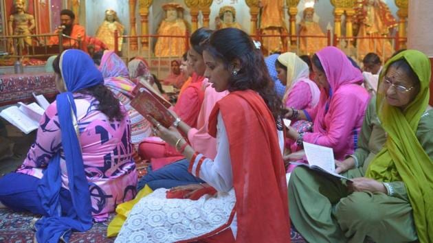 Indian Hindu devotees offer prayers for the Navratri Festival at the Mata Longa Wali Devi temple in Amritsar. As people observe fasting and meditation during these nine days, they also maintain a generally positive, calm and peaceful demeanour, aided by the strictly vegetarian diet followed these nine days. (Narinder Nanu / AFP)