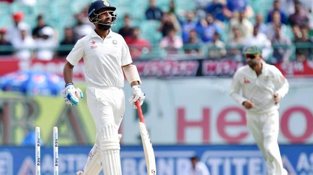 Cheteshwar Pujara reacts after being run out against Australia in Dharamsala. (PTI)
