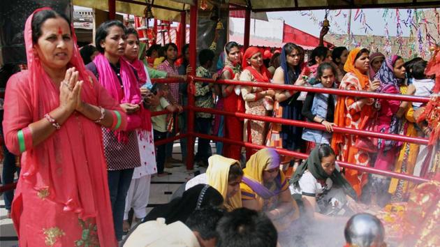 Devotees offer prayers inside the historical Kali Mata Temple on the first day of the Navratri festival in Jammu. (PTI)