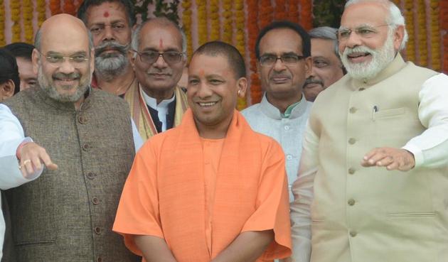 UP Chief Minister Yogi Adityanath with BJP president Amit Shah and Prime Minister Narendra Modi.(Ashok Dutta/HT Photo)