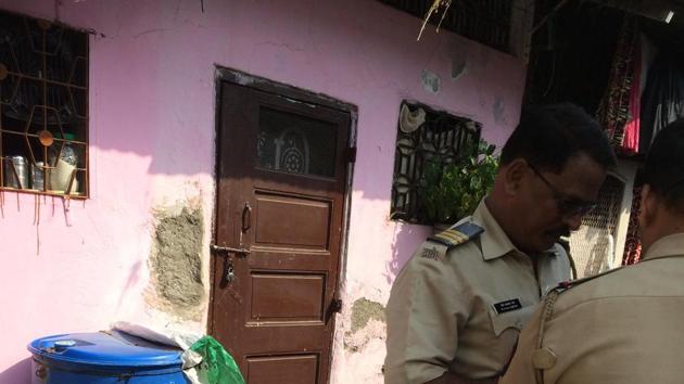 Policemen inspect couple’s residence in Nagpada on Tuesday. (HT) Policemen inspect couple’s residence in Nagpada on Tuesday. (HT)