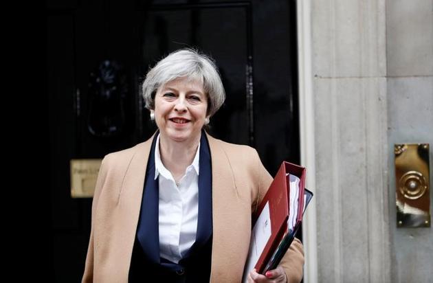 British Prime Minister Theresa May leaves 10, Downing Street in London. (Reuters) British Prime Minister Theresa May leaves 10, Downing Street in London. (Reuters)