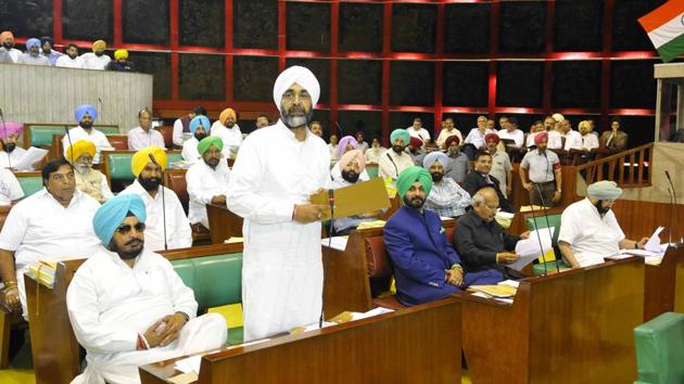 Punjab finance minister Manpreet Singh Badal presenting details of supplementary grants in the Vidhan Sabha in Chandigarh on Wednesday, March 29.(Keshav Singh/HT)