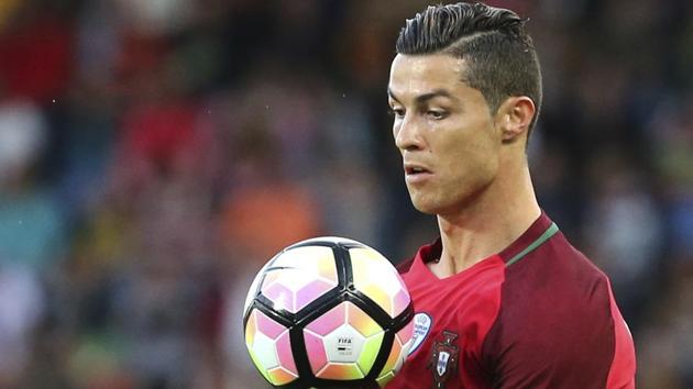 Cristiano Ronaldo controls the ball during the international friendly match between Portugal and Sweden.(AP)