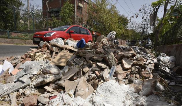 Debris and garbage at Defence colony. It falls in the top categories of the colonies in Delhi, which pay the maximum rate of property tax. (Raj K Raj/HT Photo) Debris and garbage at Defence colony. It falls in the top categories of the colonies in Delhi, which pay the maximum rate of property tax. (Raj K Raj/HT Photo)