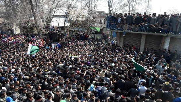 The militants fled from the spot, mingling with protestors who were demonstrating against the killing of three civilians in a firing by security forces in Chadoora area of Budgam district on Tuesday. (AFP Photo) The militants fled from the spot, mingling with protestors who were demonstrating against the killing of three civilians in a firing by security forces in Chadoora area of Budgam district on Tuesday. (AFP Photo)