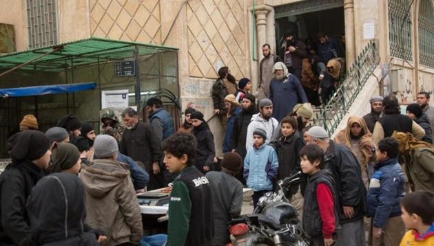 This image released by Islamic State-affiliated Aamaq news agency in March 2017 shows civilians in Raqqa, Syria. (AP Photo) This image released by Islamic State-affiliated Aamaq news agency in March 2017 shows civilians in Raqqa, Syria. (AP Photo)