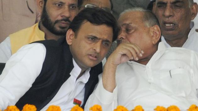 Samajwadi Party patriarch Mulayam Singh Yadav with son Akhilesh Yadav, the former chief minister of Uttar Pradesh.(HT file photo)