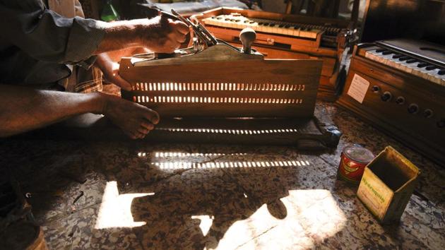 According to Gobinda, 15 days are required to make a harmonium. Though the demand of harmonium has dwindled over the years, Gobinda makes them with honesty and determination. He has three daughters, and none showed any interest in taking his legacy forward. Yet, unlike the other melody makers, he sounds optimistic. (Samir Jana/HT PHOTO)