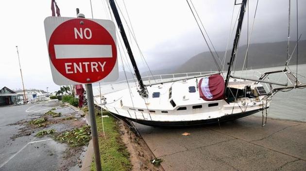 A boat is seen smashed against the bank at Shute Harbour, Airlie Beach. The storm was declared catastrophic by the Insurance Council of Australia. (AAP/Dan Peled/via REUTERS) A boat is seen smashed against the bank at Shute Harbour, Airlie Beach. The storm was declared catastrophic by the Insurance Council of Australia. (AAP/Dan Peled/via REUTERS)
