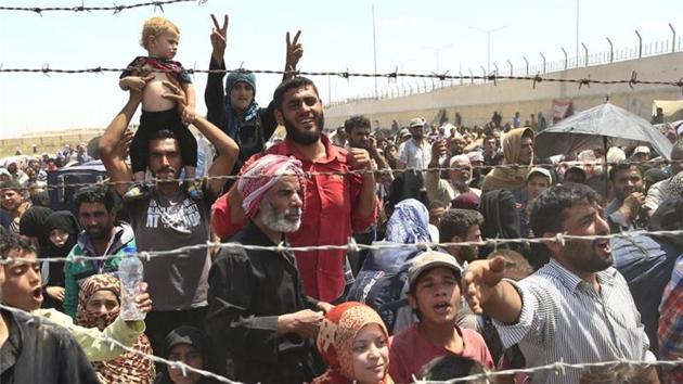 The tally of refugees who have fled the war in Syria now exceeds five million, the United Nations said. (AP File Photo) The tally of refugees who have fled the war in Syria now exceeds five million, the United Nations said. (AP File Photo)
