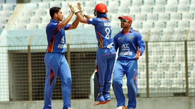 Players of the Afghanistan Emerging Team celebrate an Indian wicket during the ACC Emerging Teams Cup Group A match on Thursday. (asiancricket.org) Players of the Afghanistan Emerging Team celebrate an Indian wicket during the ACC Emerging Teams Cup Group A match on Thursday. (asiancricket.org)