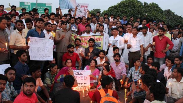 Greater Noida police arrested six men after a race riot broke out in Greater Noida during a candle march at Pari Chowk on Monday evening. (HT Photo) Greater Noida police arrested six men after a race riot broke out in Greater Noida during a candle march at Pari Chowk on Monday evening. (HT Photo)