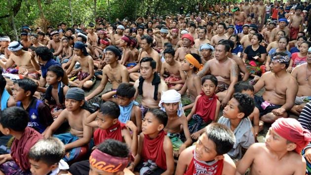 Balinese during Mebuug-buugan, in Kedonganan village. (Sonny Tumbelaka / AFP) Balinese during Mebuug-buugan, in Kedonganan village. (Sonny Tumbelaka / AFP)
