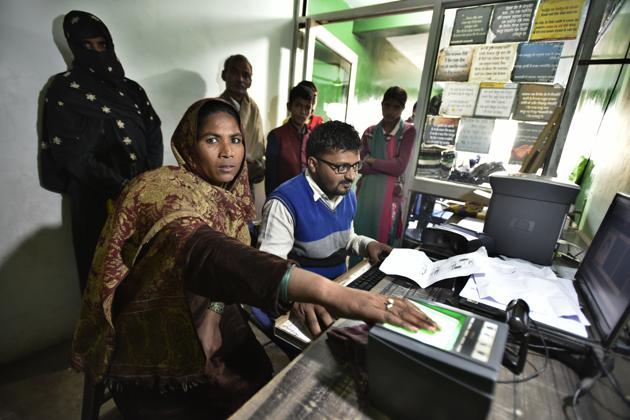 Mohd Alim helping locals for New Aadhar Card on Jan Sewa Kendra at AalKal Kairana in Uttar Pardesh , India, on Wednesday, January 18, 2017. (Raj K Raj/HT PHOTO) Mohd Alim helping locals for New Aadhar Card on Jan Sewa Kendra at AalKal Kairana in Uttar Pardesh , India, on Wednesday, January 18, 2017. (Raj K Raj/HT PHOTO)