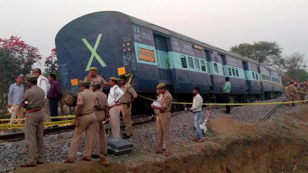 Police officials stand next to a derailed coach of a passenger train in Mahoba district in Uttar Pradesh, on March 30, 2017. (Reuters) Police officials stand next to a derailed coach of a passenger train in Mahoba district in Uttar Pradesh, on March 30, 2017. (Reuters)