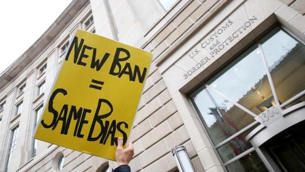 Immigration activists rally against the Trump administration's ban against travellers from six Muslim-majority nations in Washington. (Reuters File Photo) Immigration activists rally against the Trump administration's ban against travellers from six Muslim-majority nations in Washington. (Reuters File Photo)