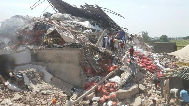 The cold storage building that collapsed after the blast in Sangrur on Friday.(HT Photo)