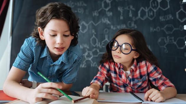Researchers have come up with a genetic score comprising around 20,000 of DNA variants that they say can explain 5% of the differences between children’s reading performance. (Images: Shutterstock) Researchers have come up with a genetic score comprising around 20,000 of DNA variants that they say can explain 5% of the differences between children’s reading performance. (Images: Shutterstock)
